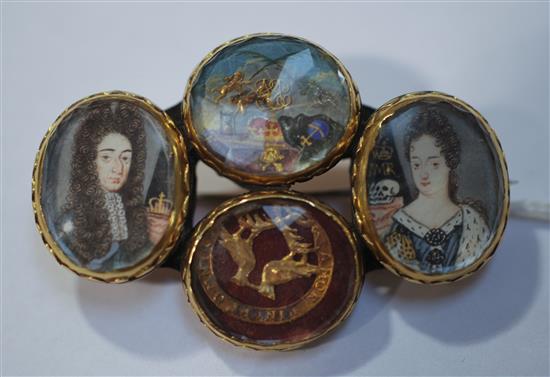 Four late 17th century gold mounted Stuart crystal oval slides later mounted together as a brooch, width 54mm.